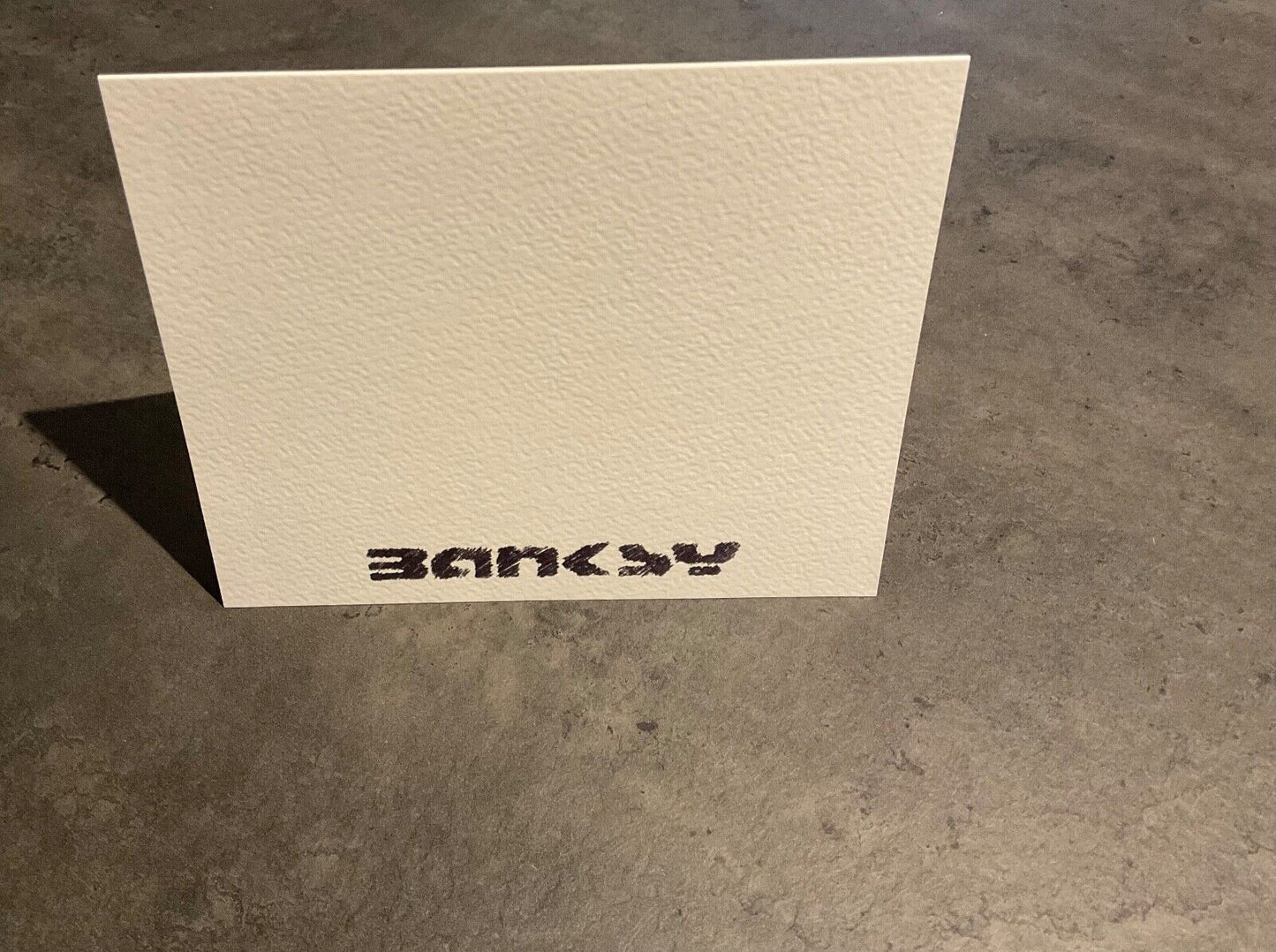 Banksy – Cartolina di Natale “Pupazzo di Neve Scortese” (2003)